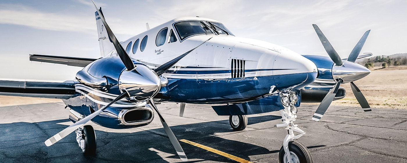White and BLue Turboprob Aircraft front view
